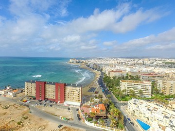 Отремонтированный на первой линии пляжа Плайя-Лос-Локос с впечатляющим видом на море. - Lotus Properties