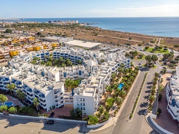 Superfin lägenhet i populära Res. La Calma med 4 pooler i Playa Flamenca - Lotus Properties