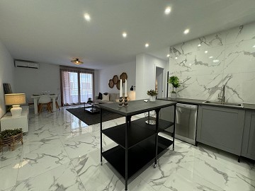 STUNNING RENOVATED 4-BEDROOMS APARTMENT WITH PRIVATE GARAGE – JUST 200 METERS FROM THE BEACH IN TORREVIEJA. - Lotus Properties