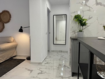 STUNNING RENOVATED 4-BEDROOMS APARTMENT WITH PRIVATE GARAGE – JUST 200 METERS FROM THE BEACH IN TORREVIEJA. - Lotus Properties