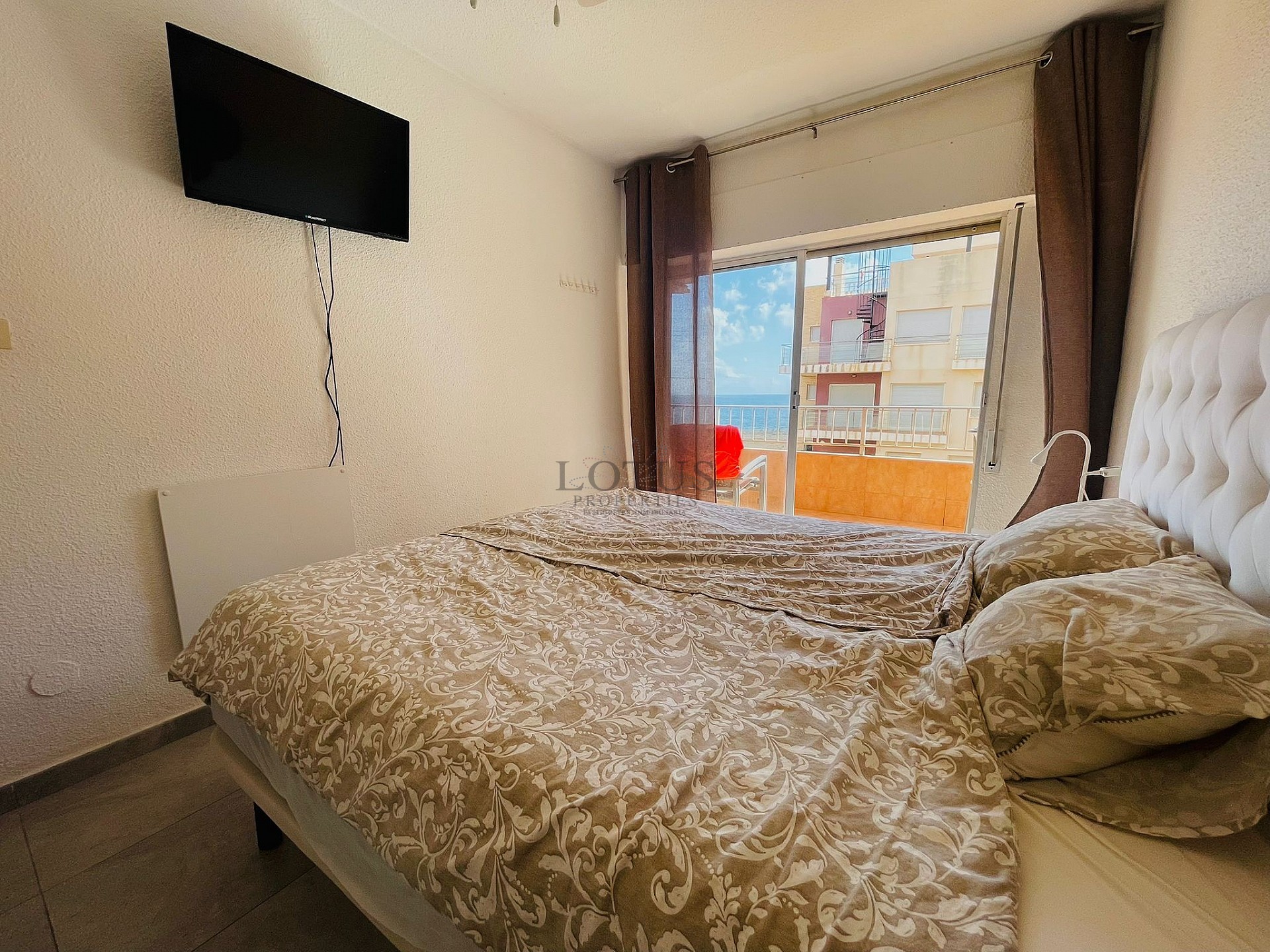 Apartamento en primera línea de Punta Prima con mágicas vistas al mar - Lotus Properties