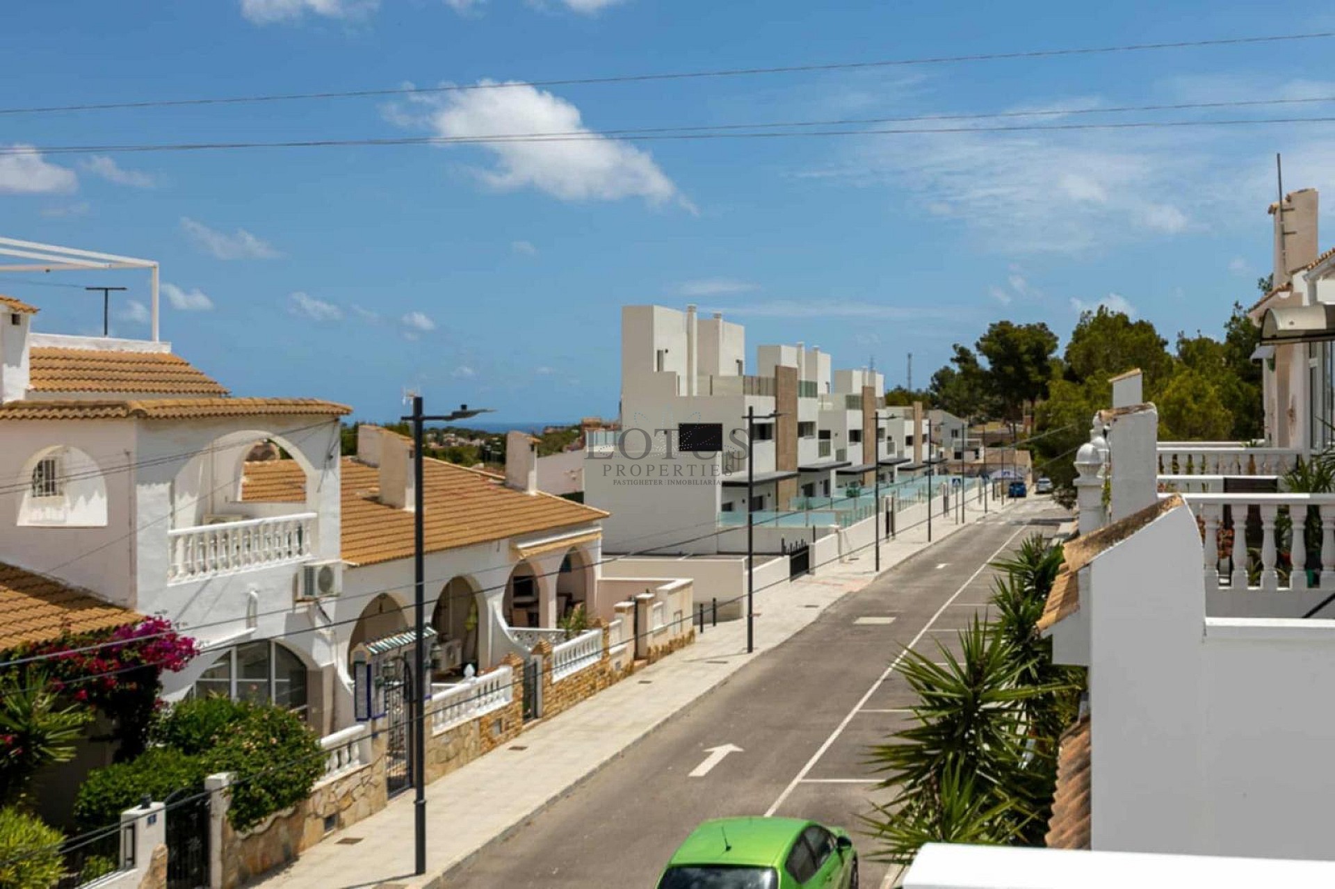 Charming Corner Townhouse with Stunning Roof Terrace and Sea Views in Villamartin - Lotus Properties