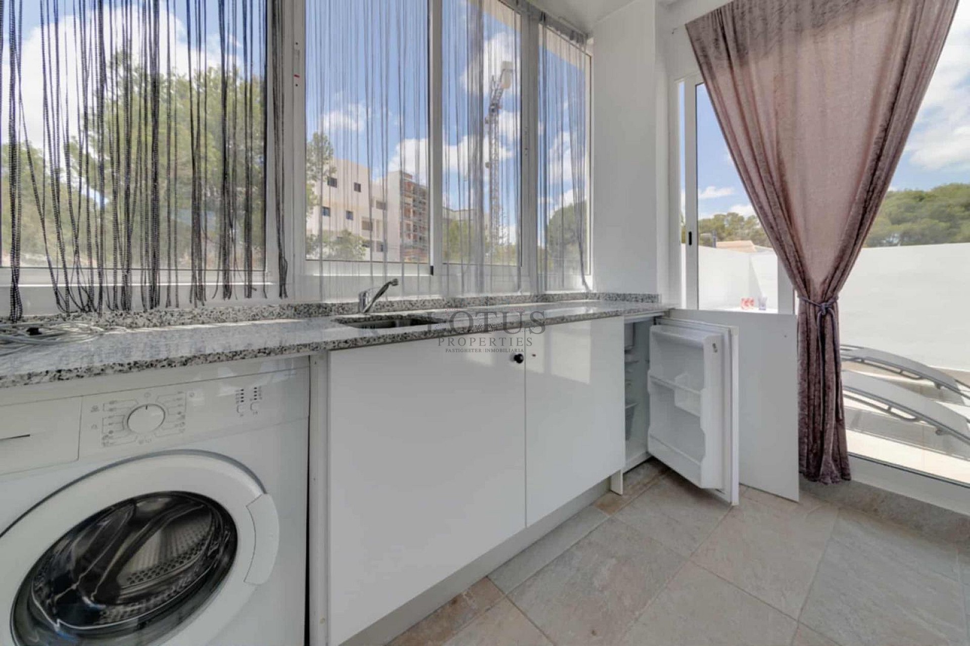 Charming Corner Townhouse with Stunning Roof Terrace and Sea Views in Villamartin - Lotus Properties