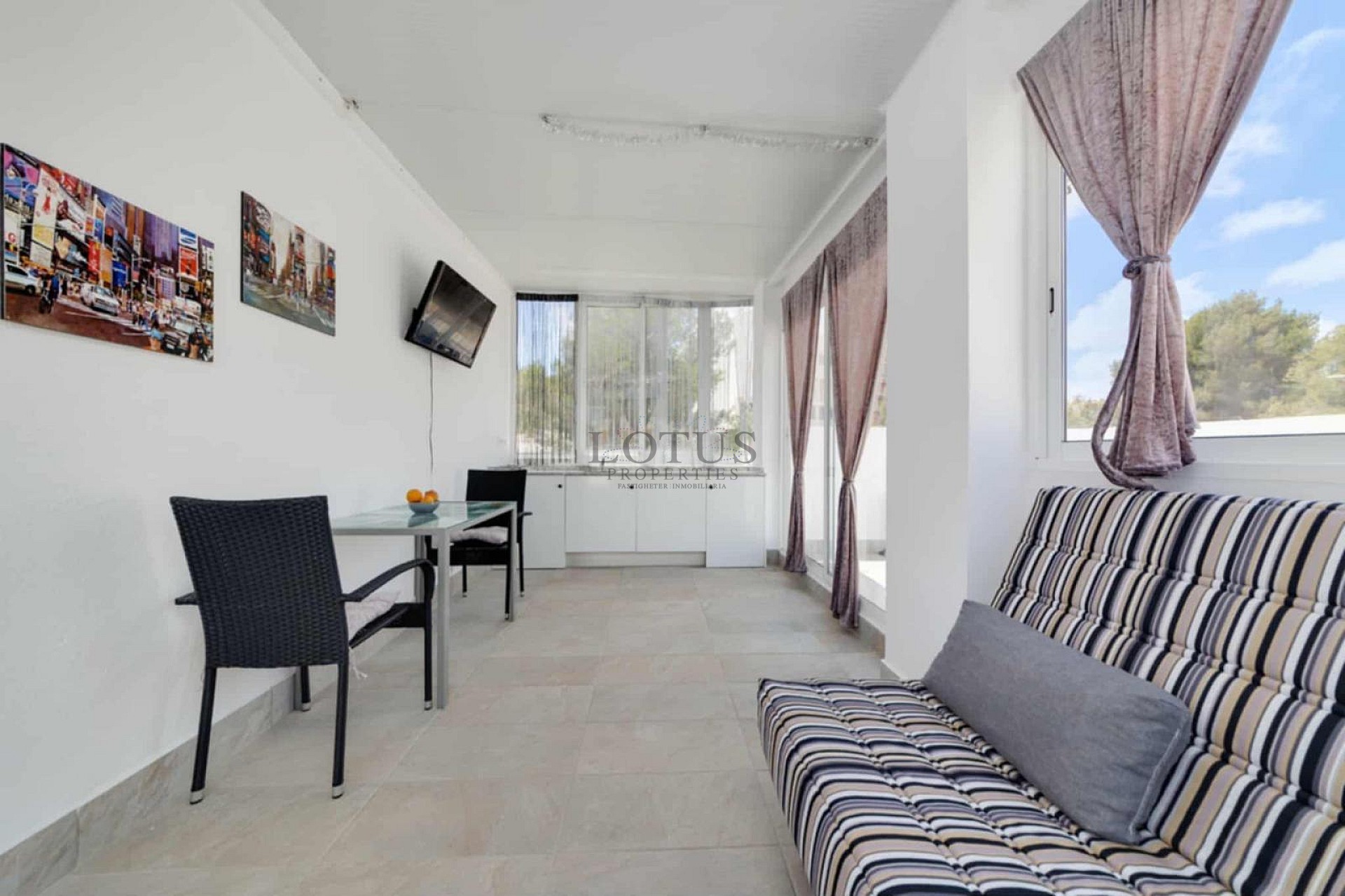 Charming Corner Townhouse with Stunning Roof Terrace and Sea Views in Villamartin - Lotus Properties