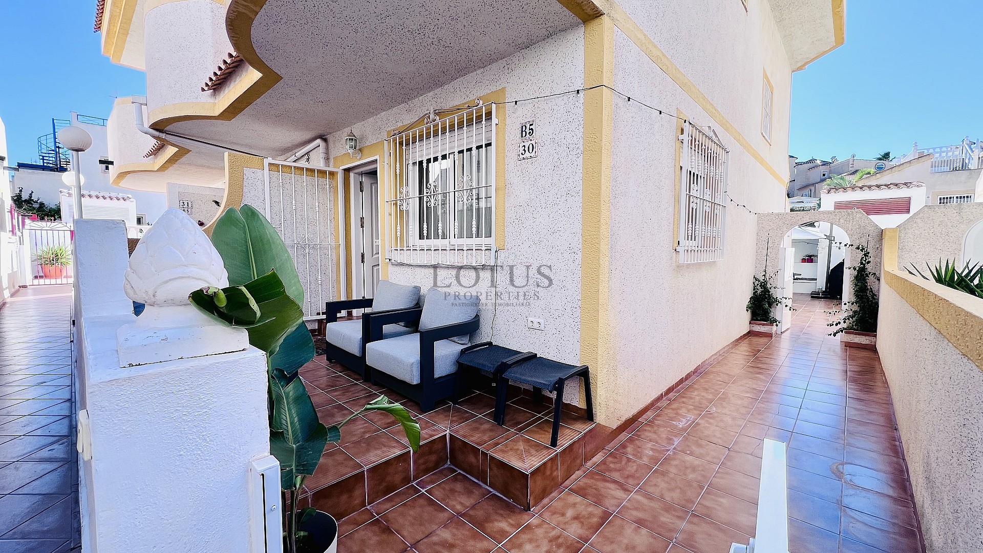 Mediterranean Dream in Villamartin – Three-Bedroom Townhouse with Pool and Corner Garden - Lotus Properties