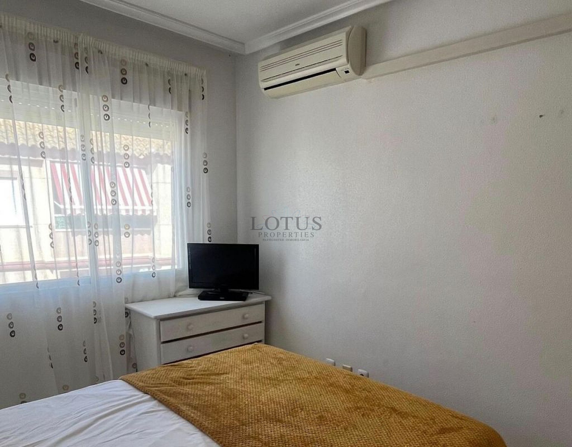 Spacious 2-Bedroom Top Floor Cecilia Apartment with Private Solarium & Storage in Algorfa - Lotus Properties